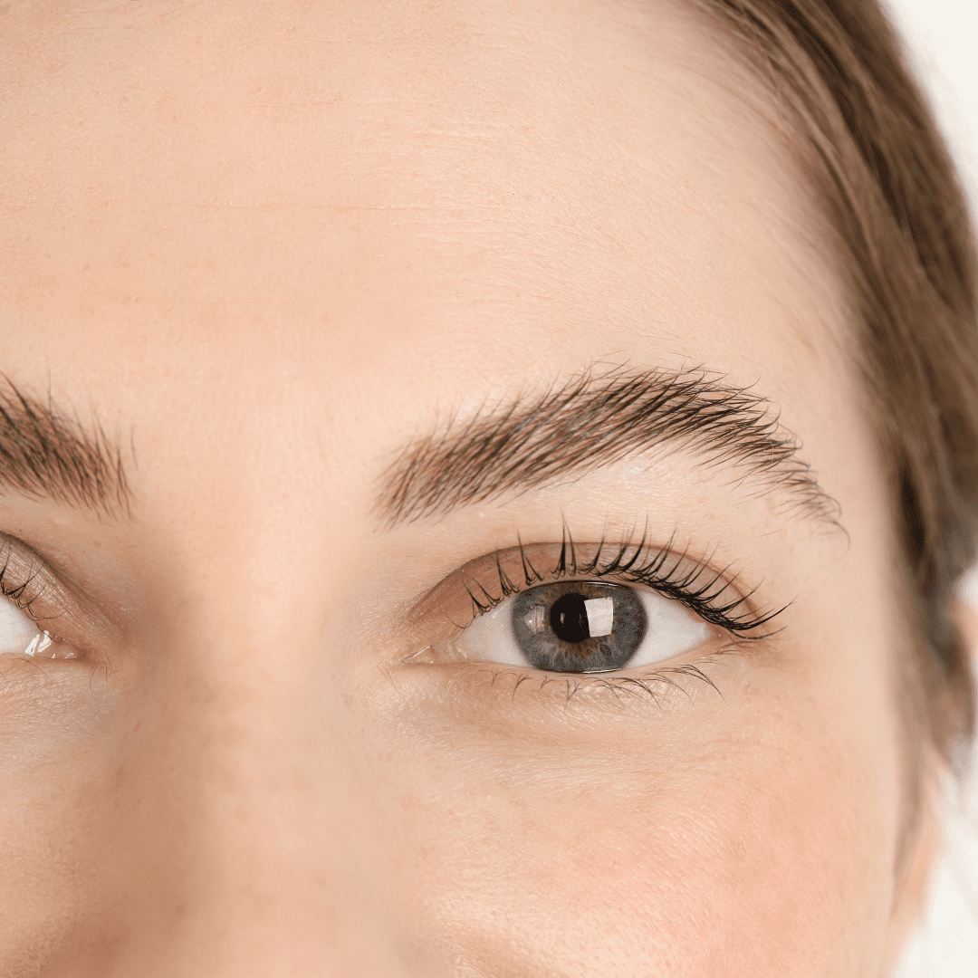 Evenly tinted lashes and brows, showing results of a combined eyes and brows treatment in Kent at River Cottage Beauty Salon in Hamstreet.